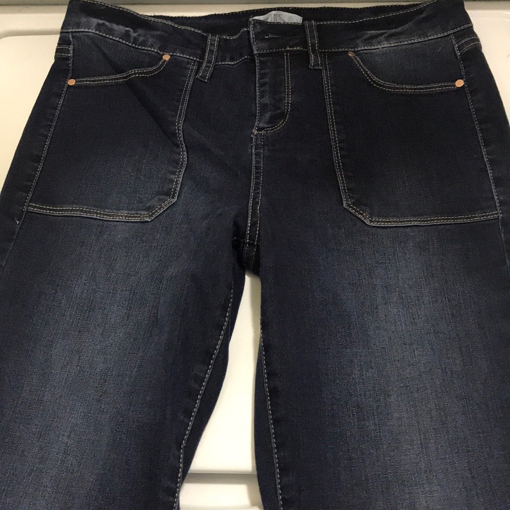 Dark washed straight leg jeans.